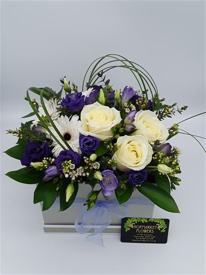 A touch of class hat box arrangement